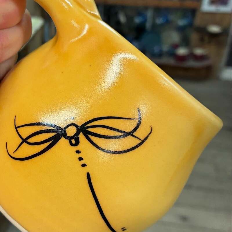 The Mud Room Clayworks dragonfly mark